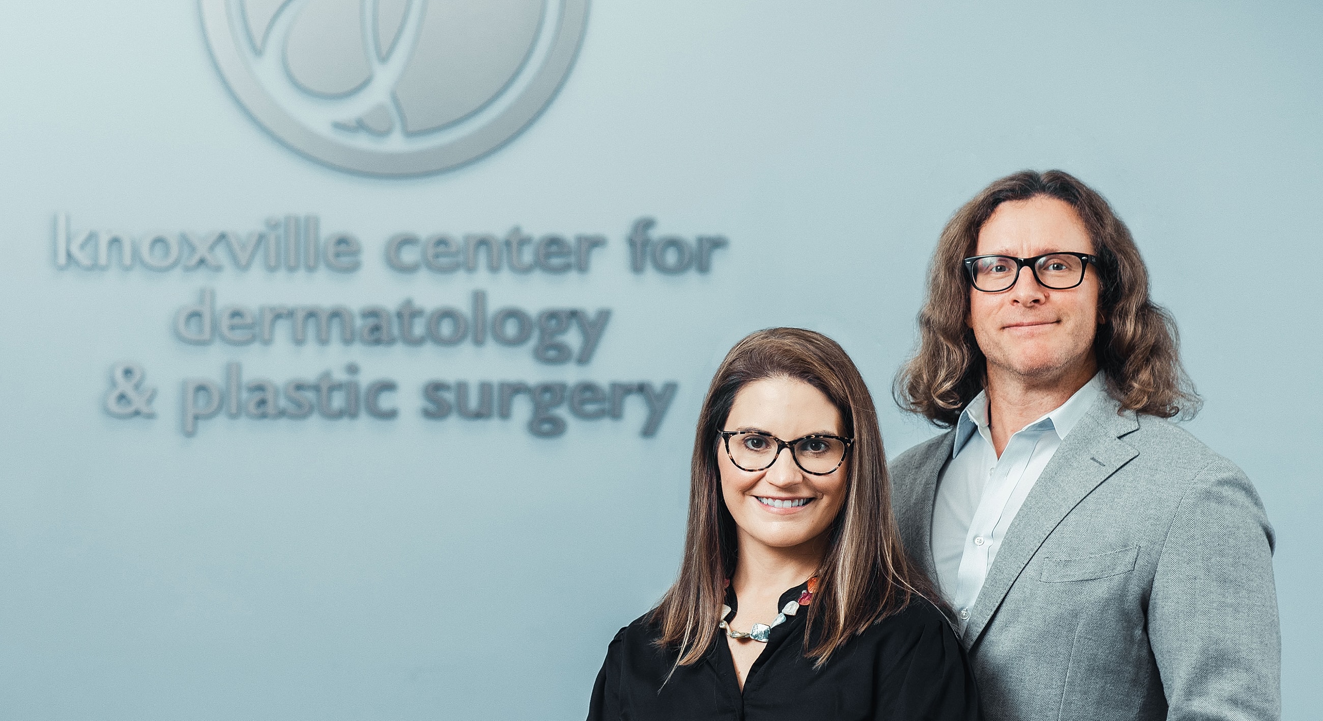 Medical professionals at dermatology and plastic surgery center